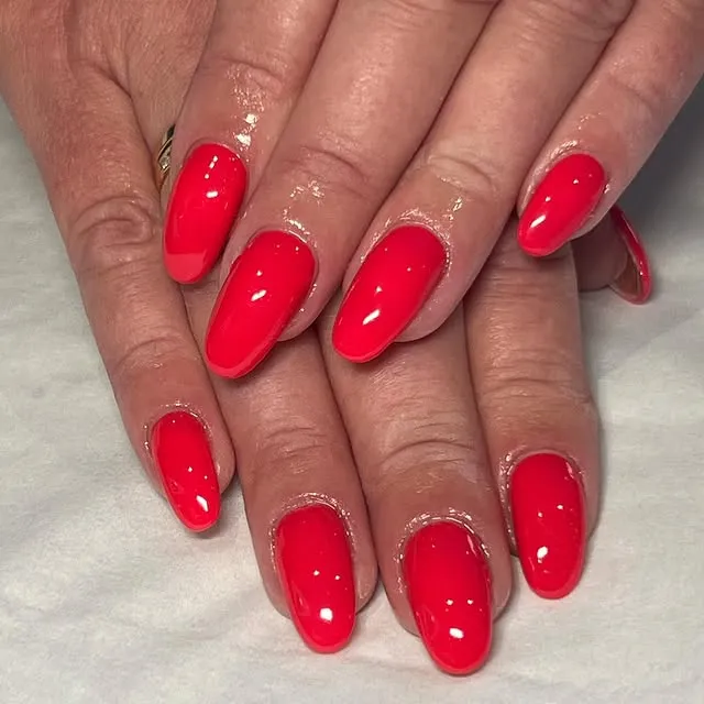 Bright cherry red nails by Chloe at Beautano on Glasgow’s Southside